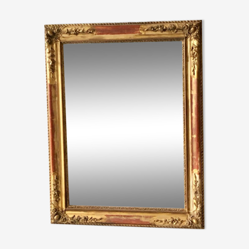 Miroir ancien à moulures dorées
