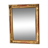 Miroir ancien à moulures dorées
