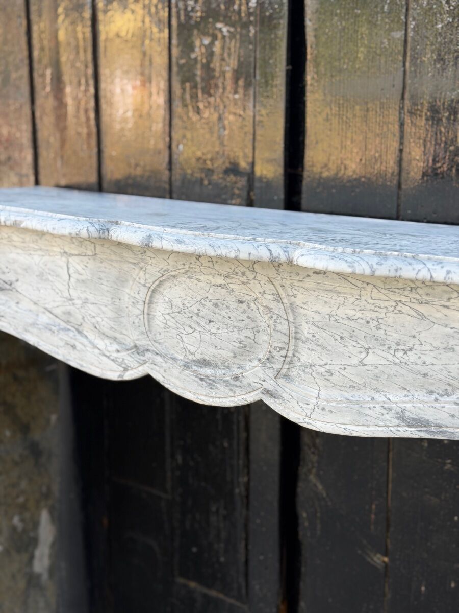 Pompadour model fireplace in blue Turquin marble from around 1880, one pair available.