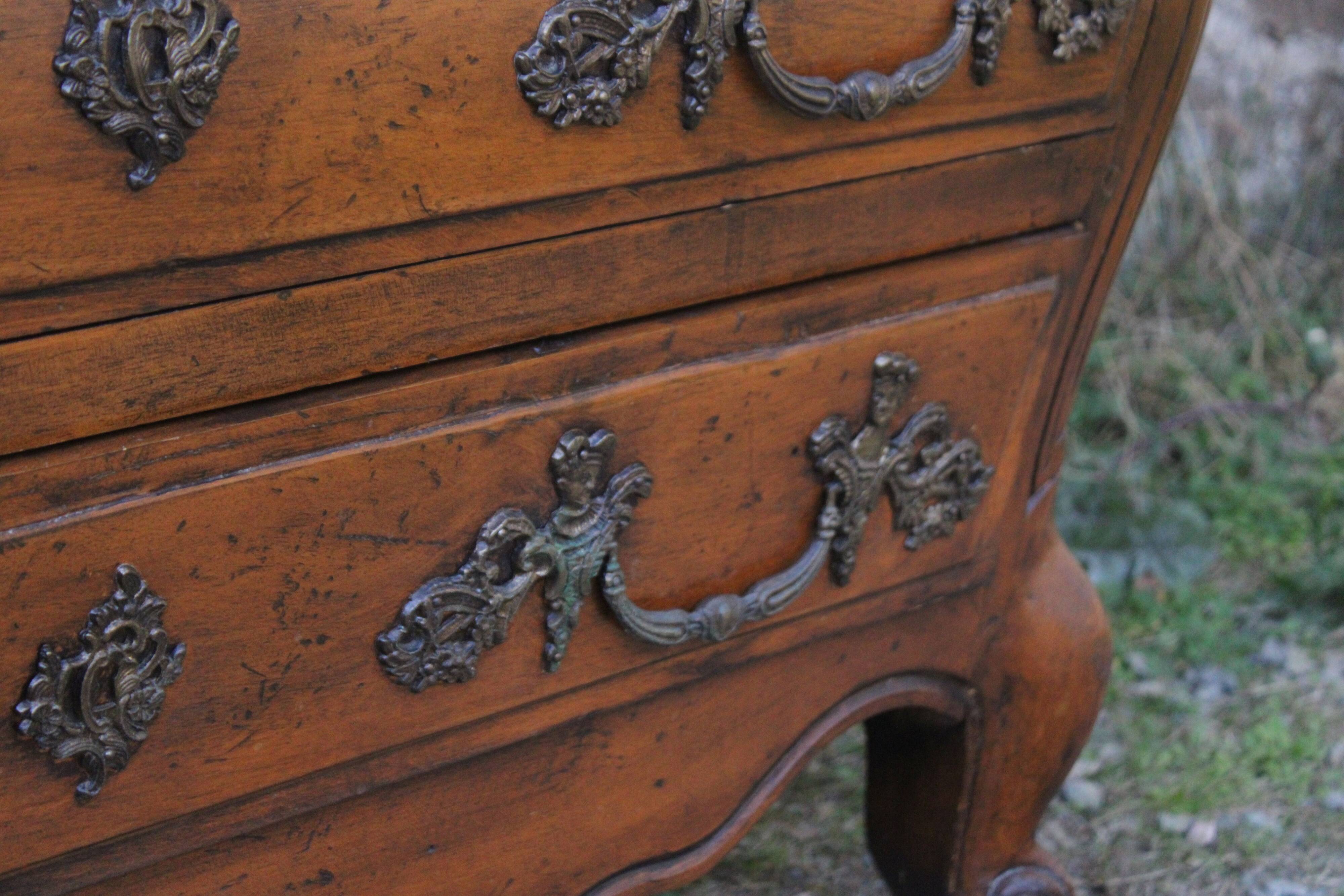 Curved Louis XV style chest of drawers known as a “tomb”