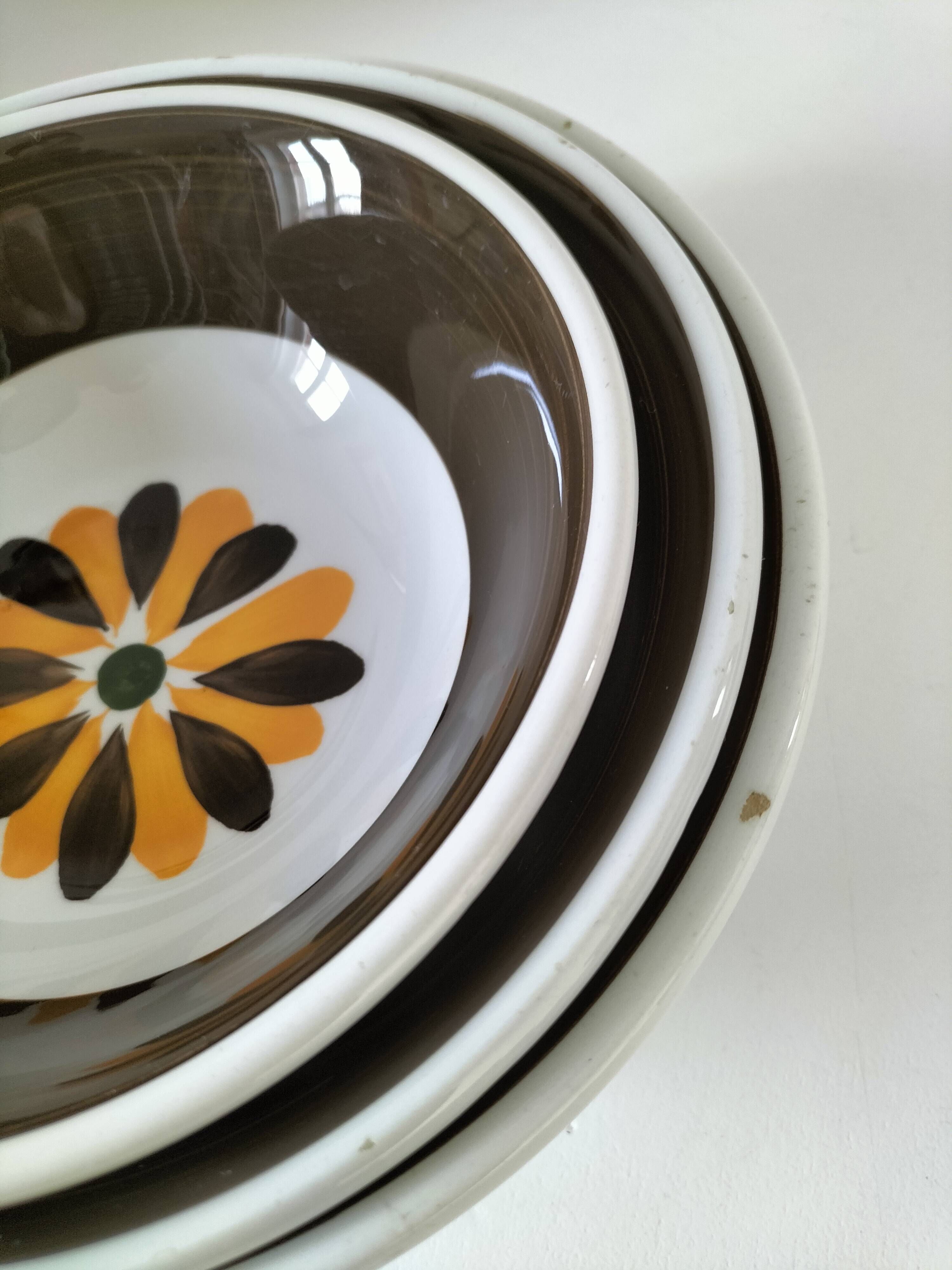Trio of Italian 1970s deep plates, ochre brown floral decoration