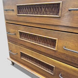 Vintage 1970s chest of drawers: wood and rattan, splayed legs.
