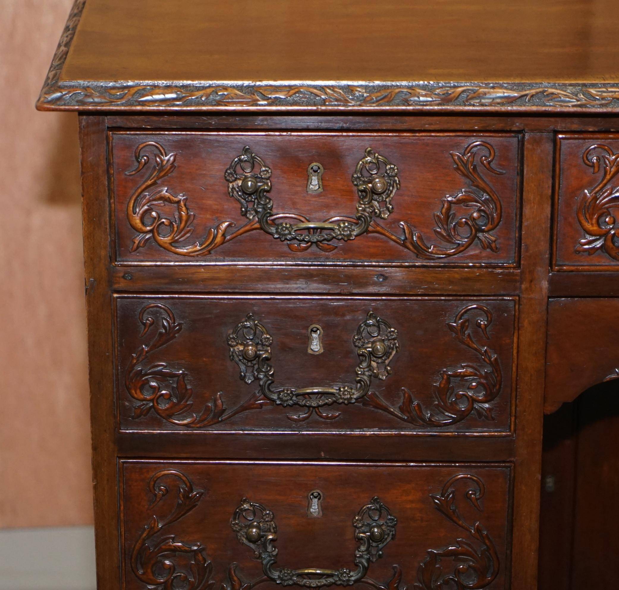 Victorian hand-carved kneehole desk 1850