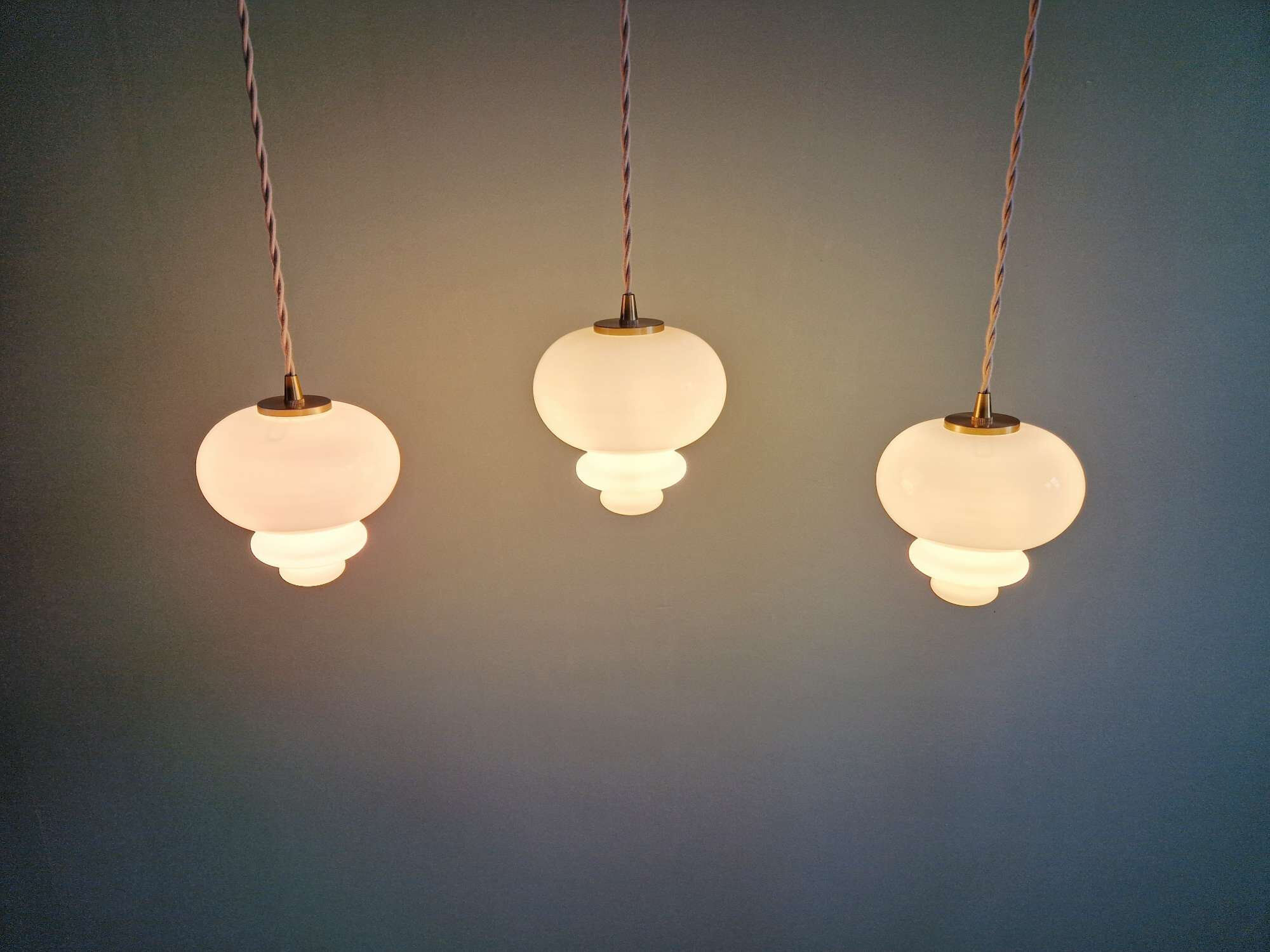 Scandinavian trio of suspensions in white opaline, 1960s