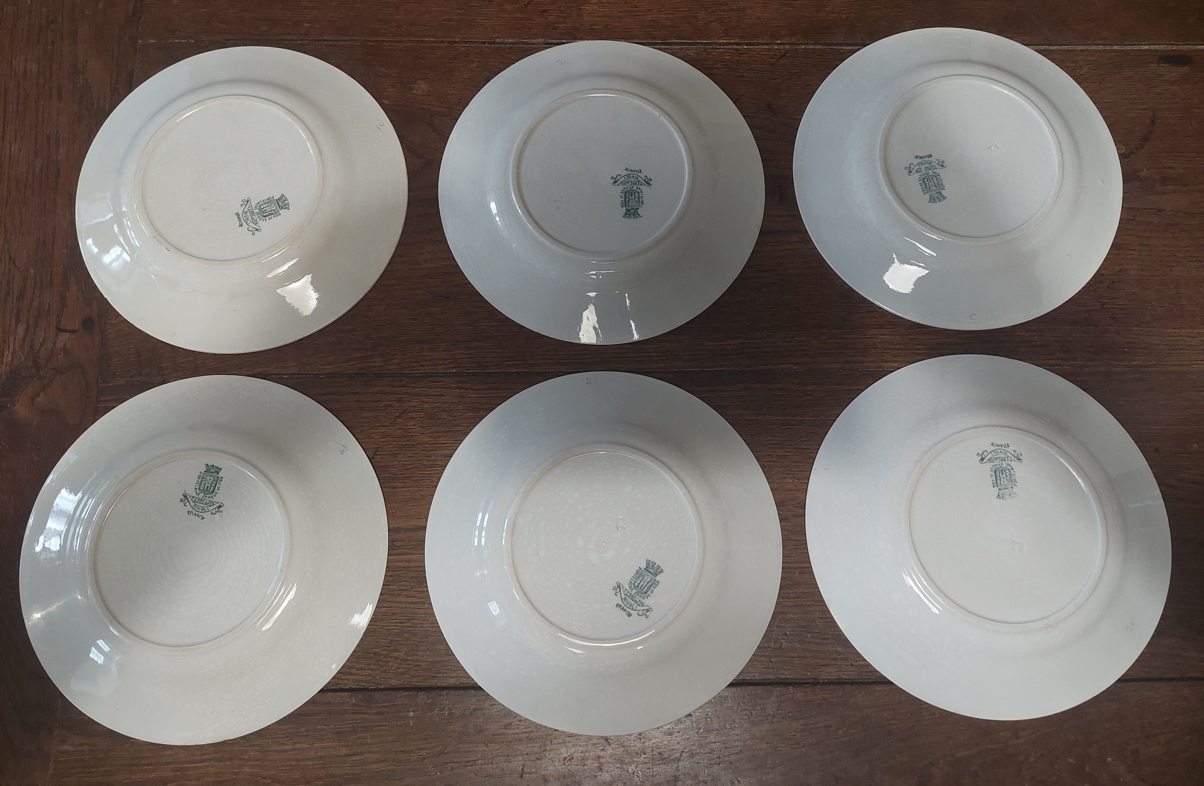 Série de six assiettes plates Gien terre de fer décor Rivoli fin XIXème