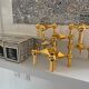 Series of 3 gold Nagel modular candlesticks