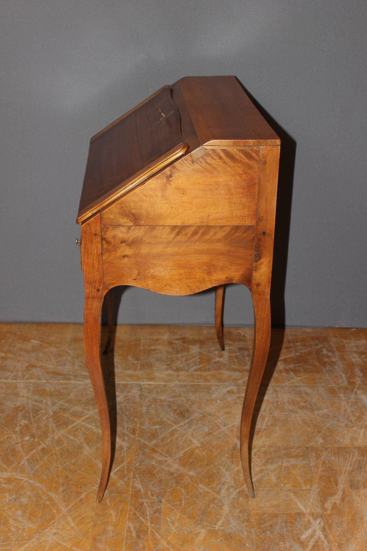 Louis XV donkey back desk in 18th century walnut