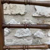 Old children's bed with retractable walnut bars