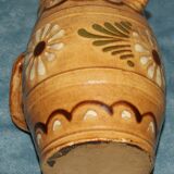 Glazed terracotta pitcher decorated with friezes and flowers