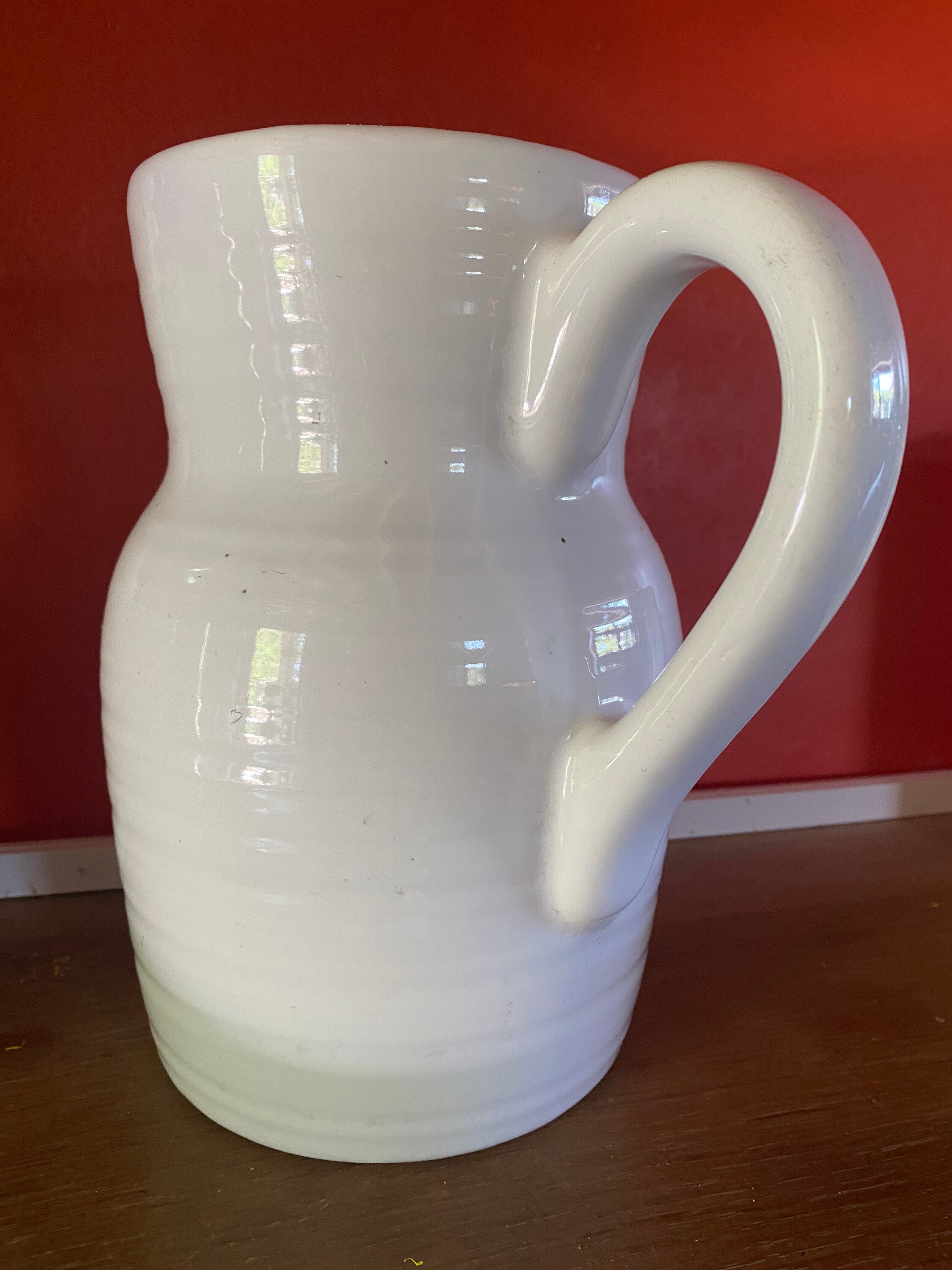Large white ceramic pitcher