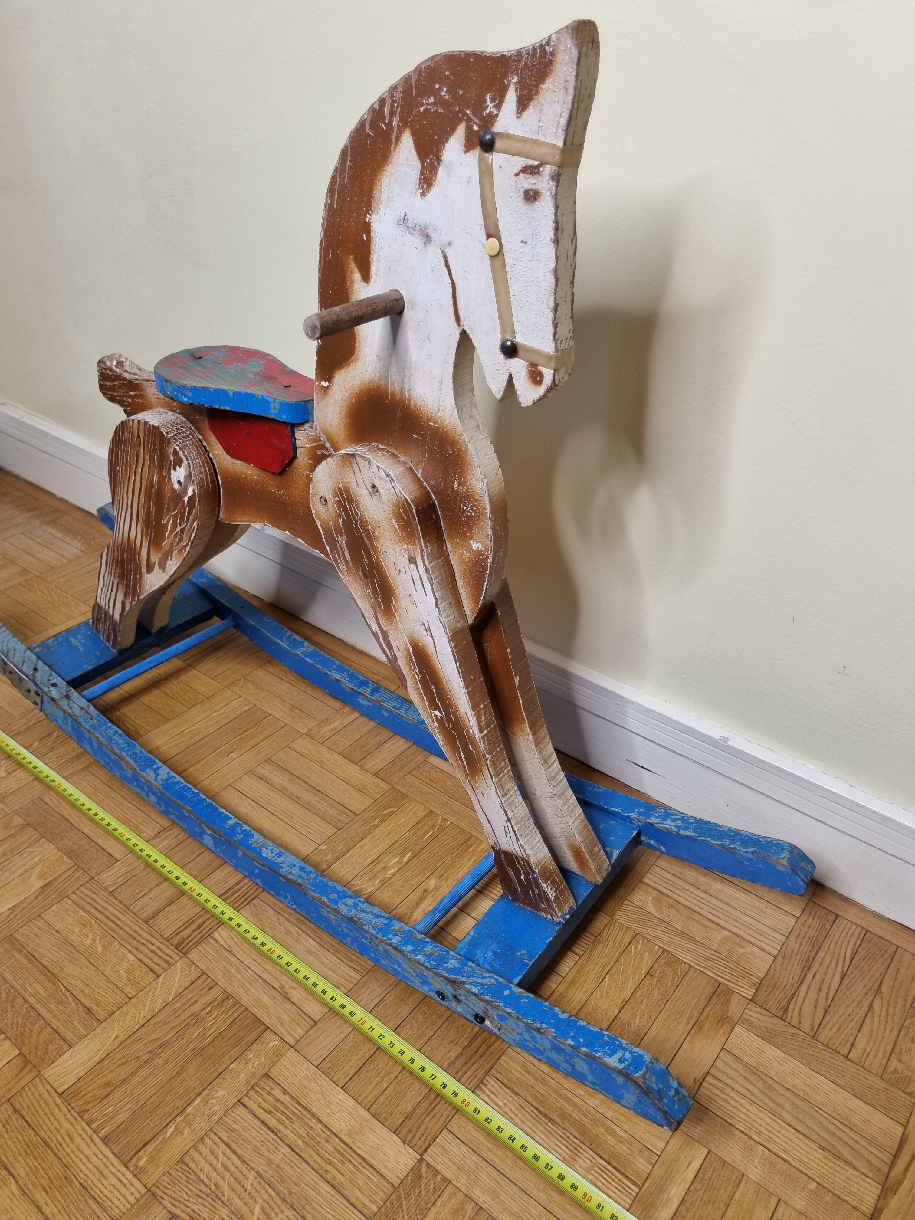 Old rocking horse in painted wood, 50s