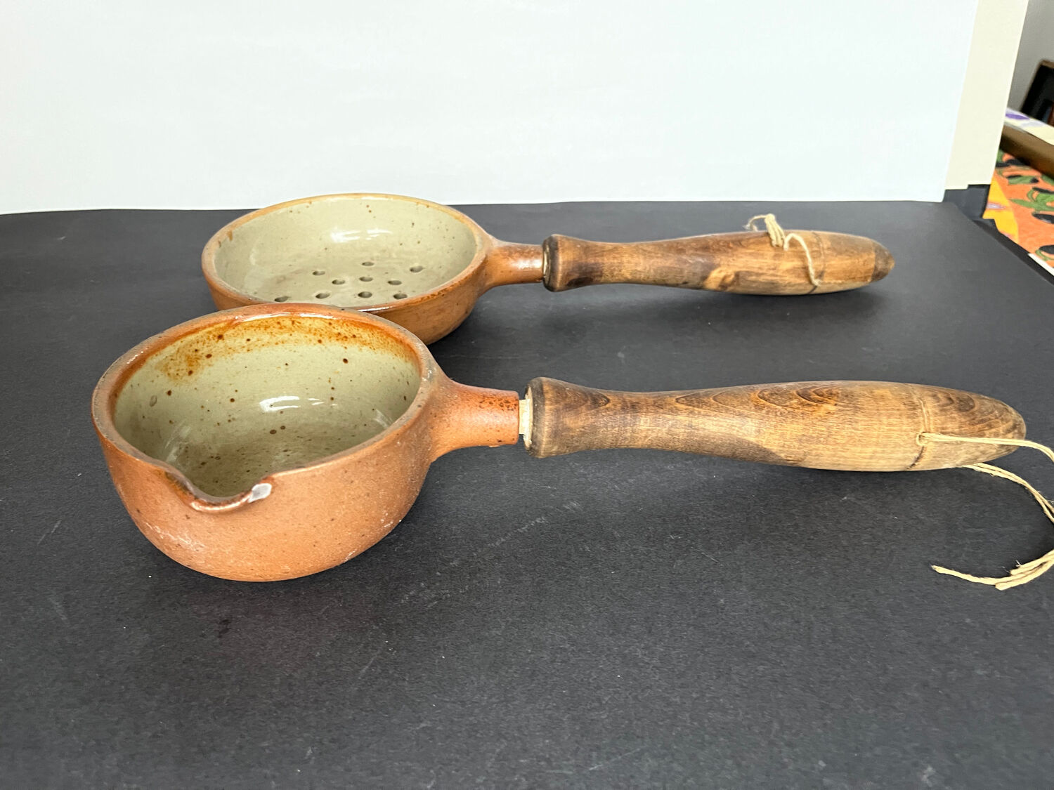 Ladle and sandstone strainer