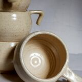 Six vintage potter's ceramic cups with vanilla enamel