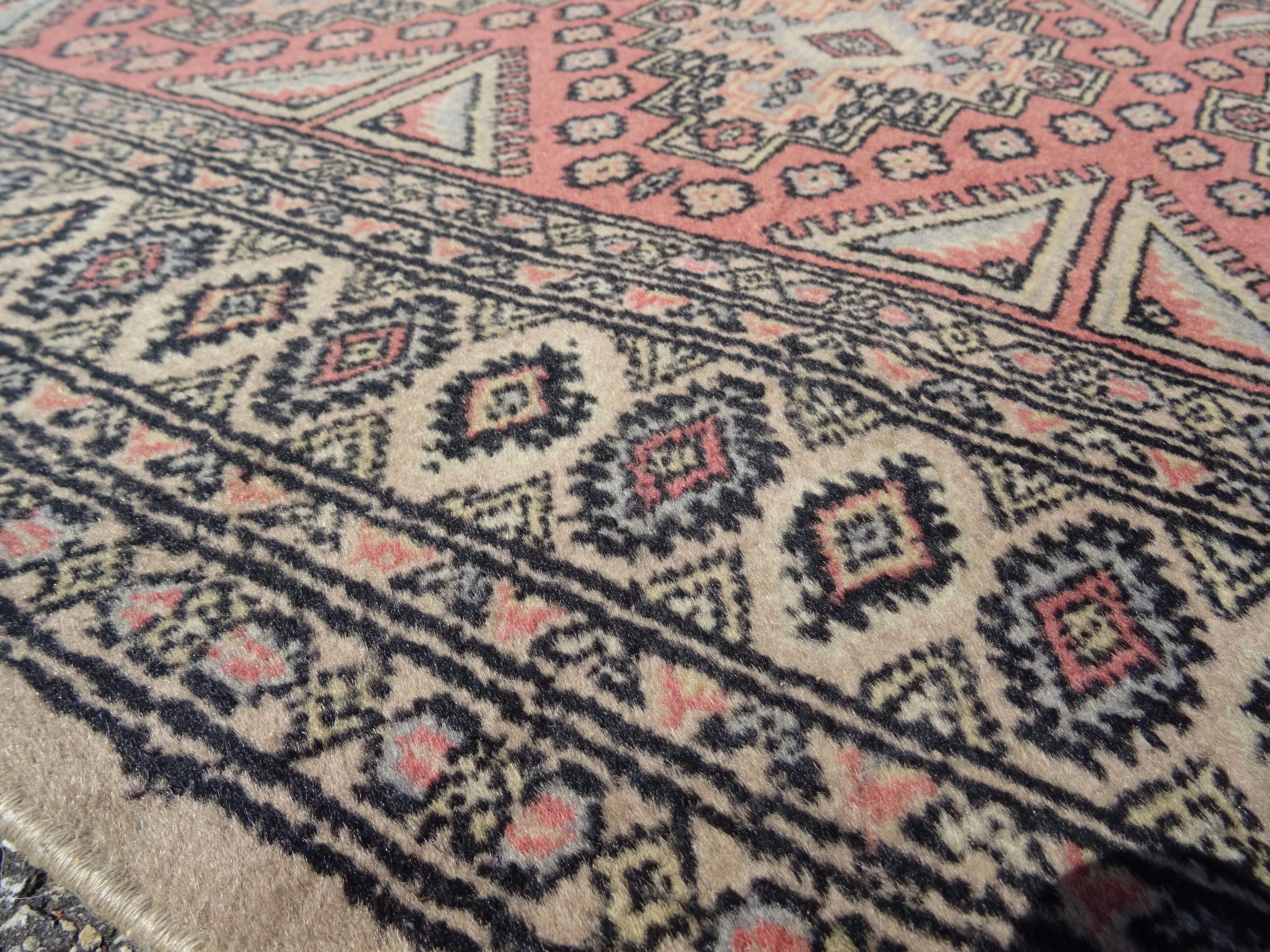 Pakistani carpet Bukhara handmade wool signed