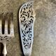 2 silver openwork service cutlery sets engraved with "AS"