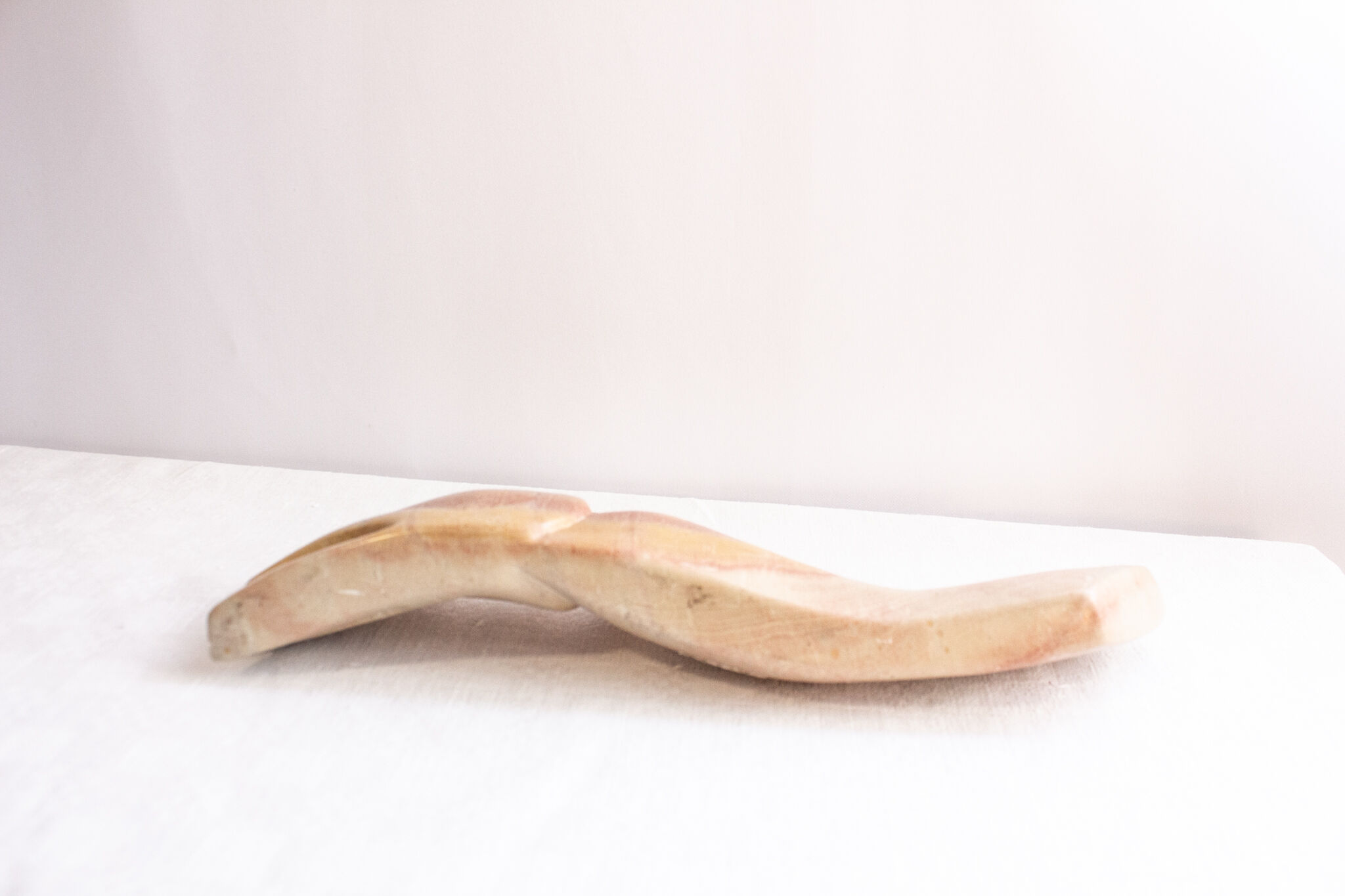 Inuit marble statuette. Primitive whale statue. Artifact from North America.