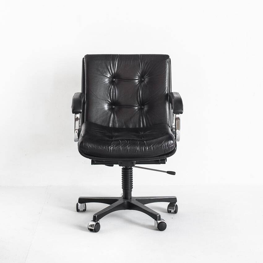 Vintage leather armchair. Swivel, on casters, multi-position. Norway, 1970s.