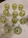 Set of 11 large crystal wine glasses on stems.