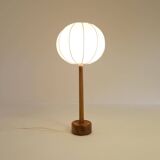 Mid-century solid teak table lamp from the 1960s Sweden.
