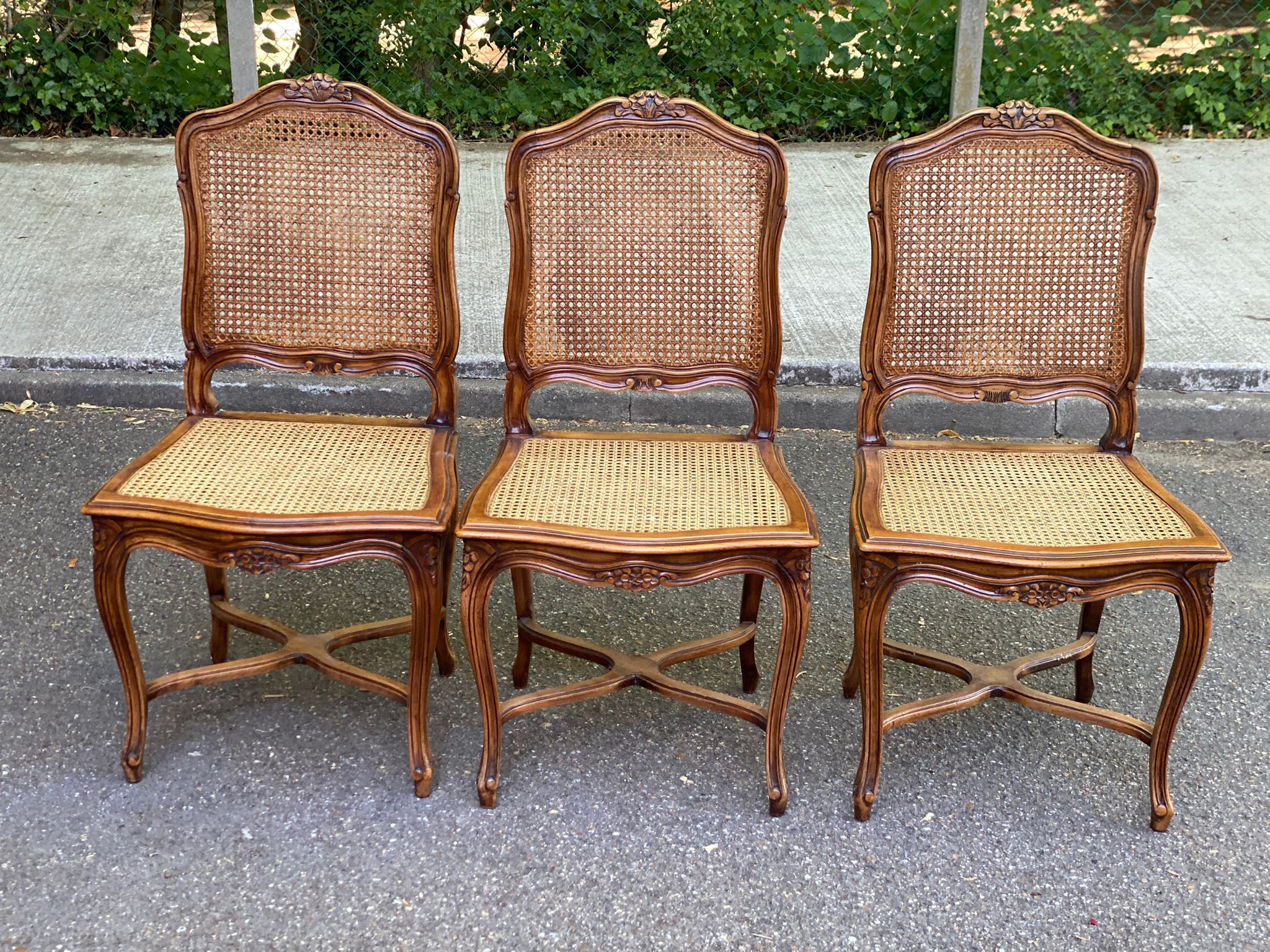 2 Louis XV style chairs in solid oak with rush seating from La Meublerie Meulin.