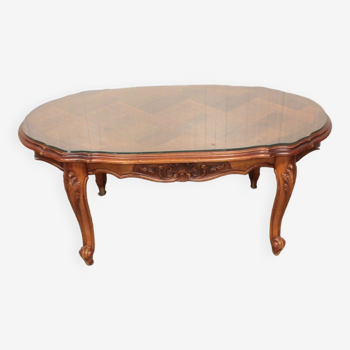 Table basse ovale style Louis XV avec plateau en verre