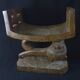 Togolese ethnic stool in carved exotic wood.