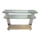Hollywood Regency console style in travertine, glass, and Lucite.