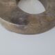 Letter O of sign in vintage gilded brass
