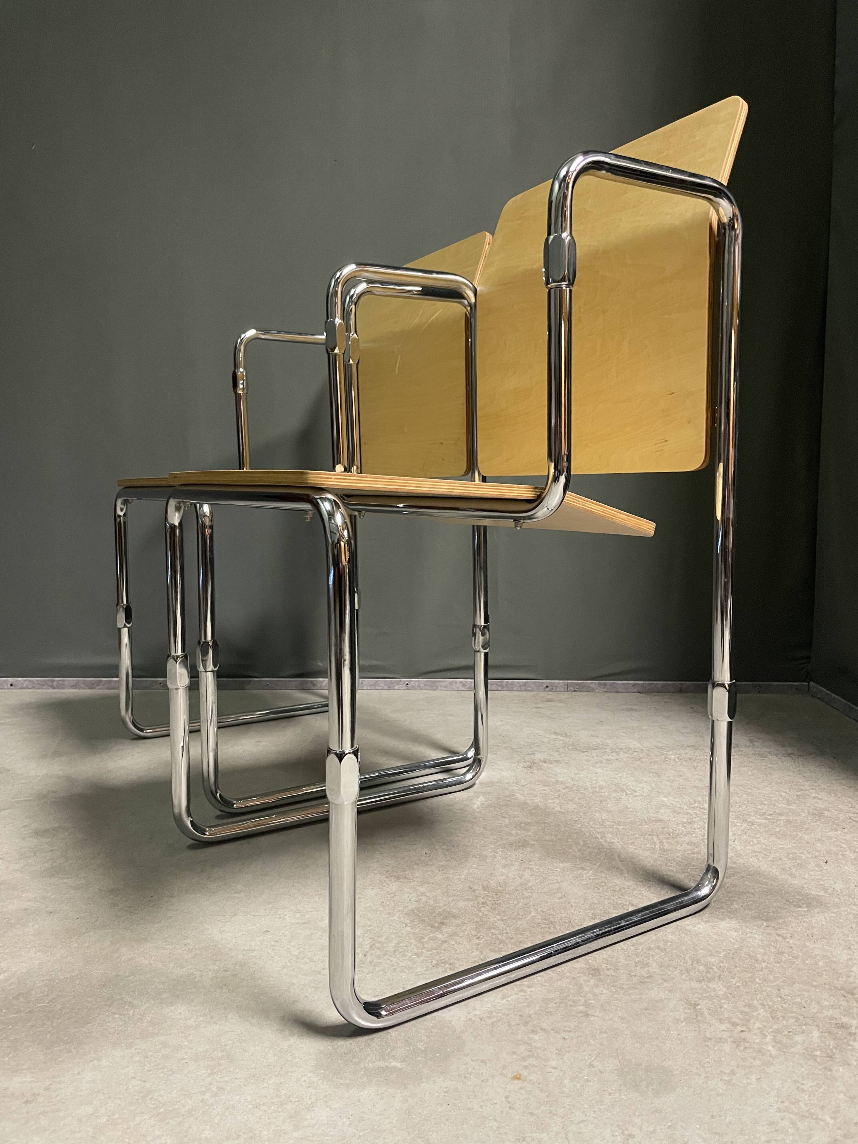 A pair of Gerrit Thomas Rietveld Hopmi chairs