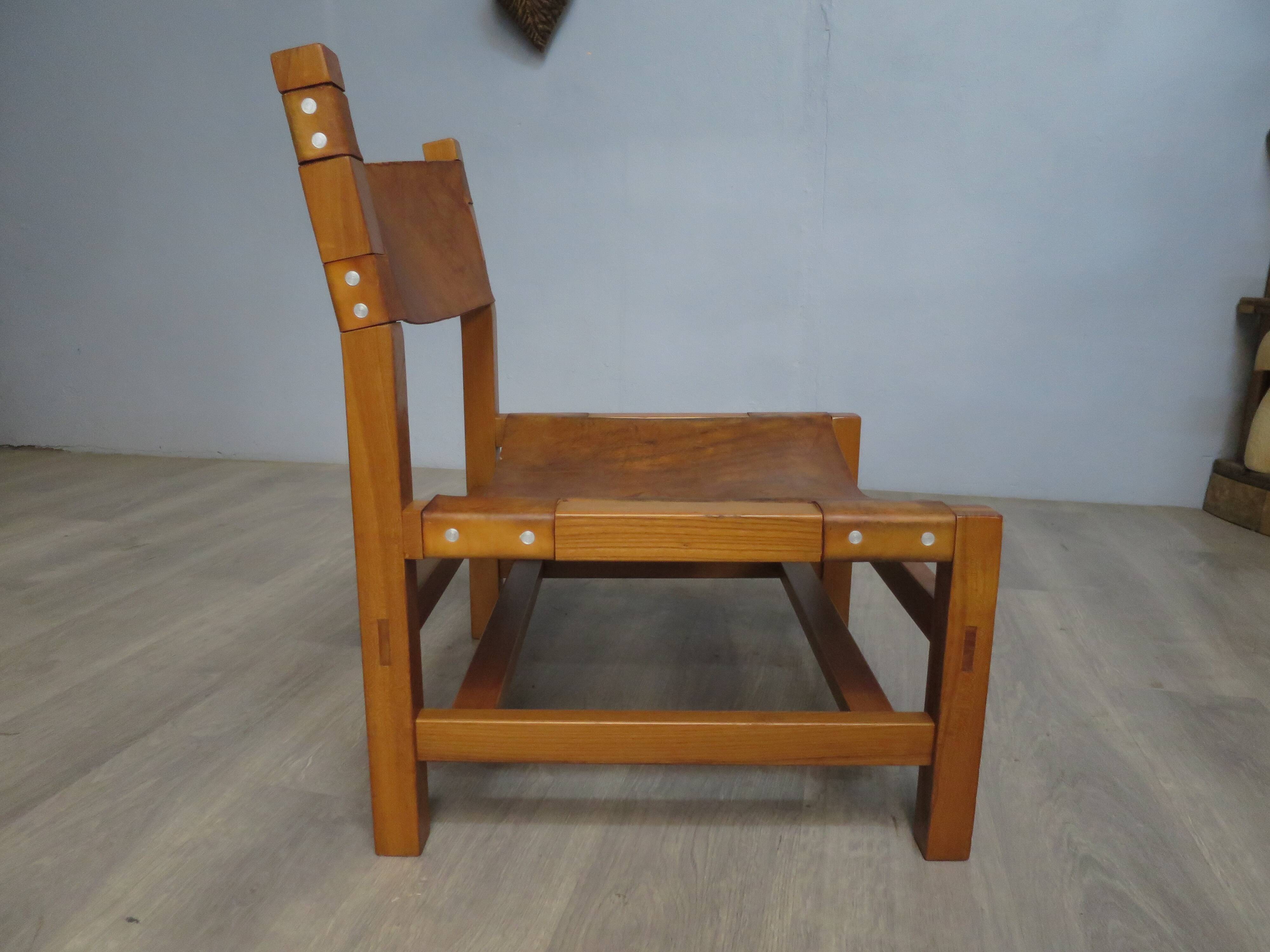 Elm and leather armchair Maison Regain