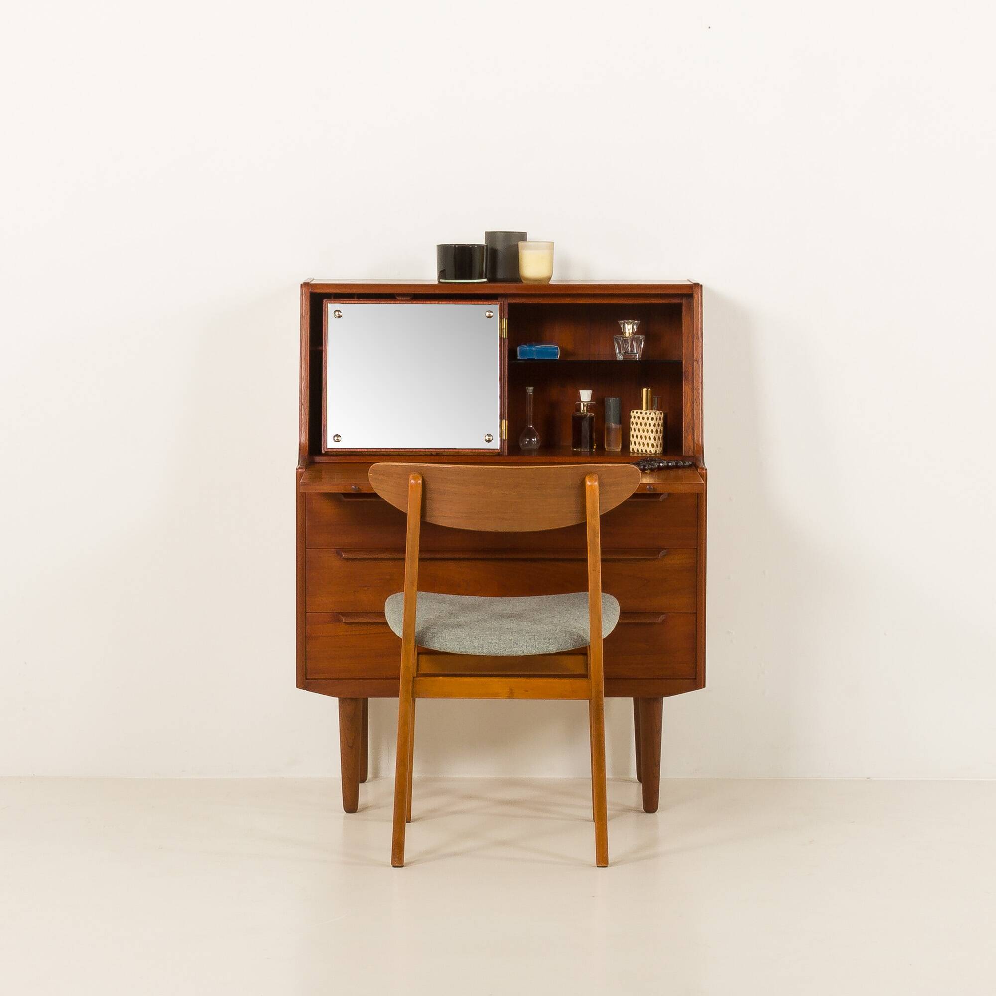 Danish  mid century teak  bureau with a hidden vanity by Ølholm Møbelfabrik