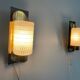 Mid-century pair of wall sconces in textured glass and brass, 1950s, Germany.