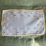 Lot of two old embroidered doilies