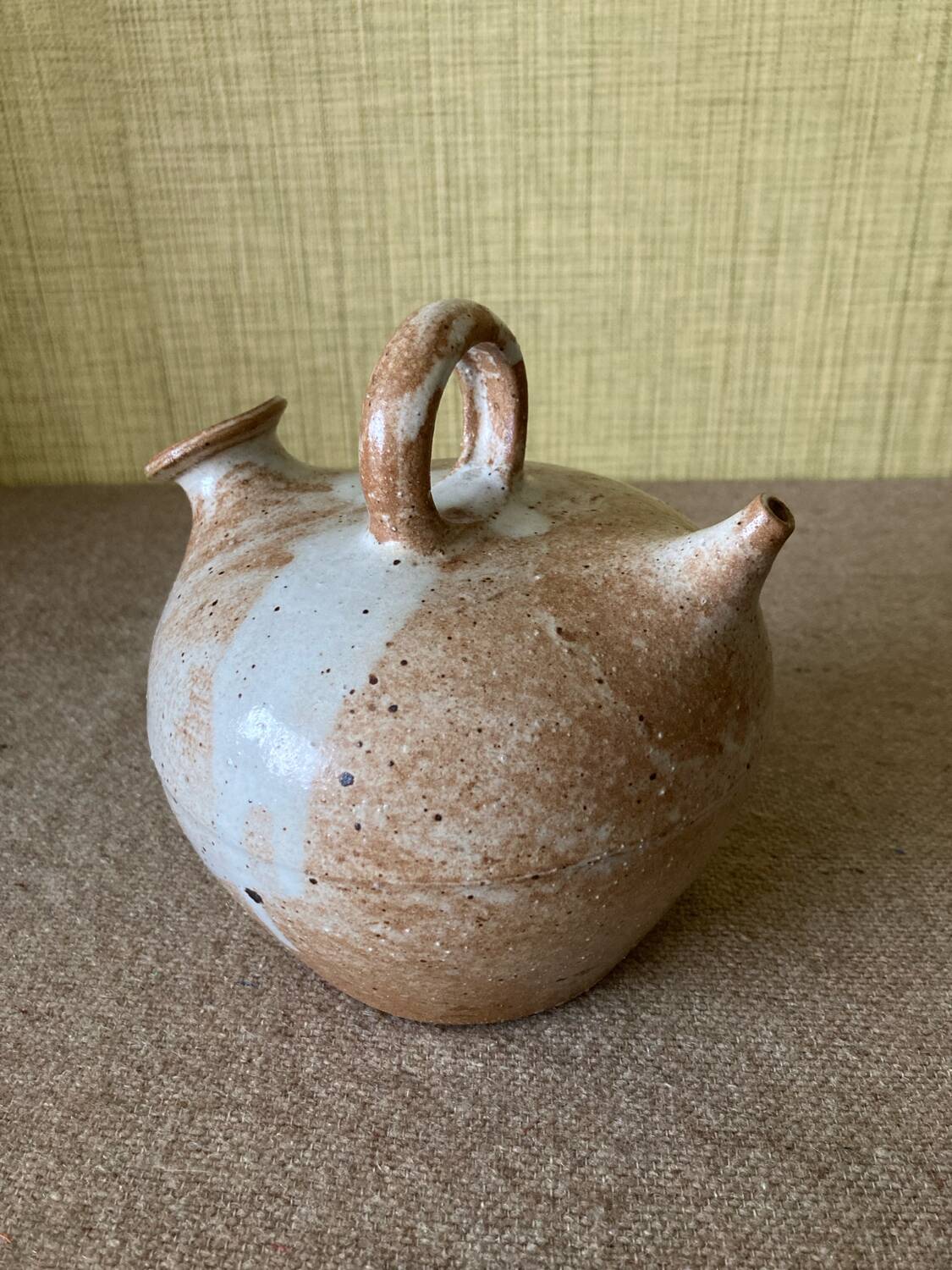 Small sandstone goat in the style of marsh sandstone or hot air balloon