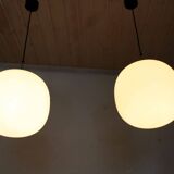 Pair of opal glass pendant lights