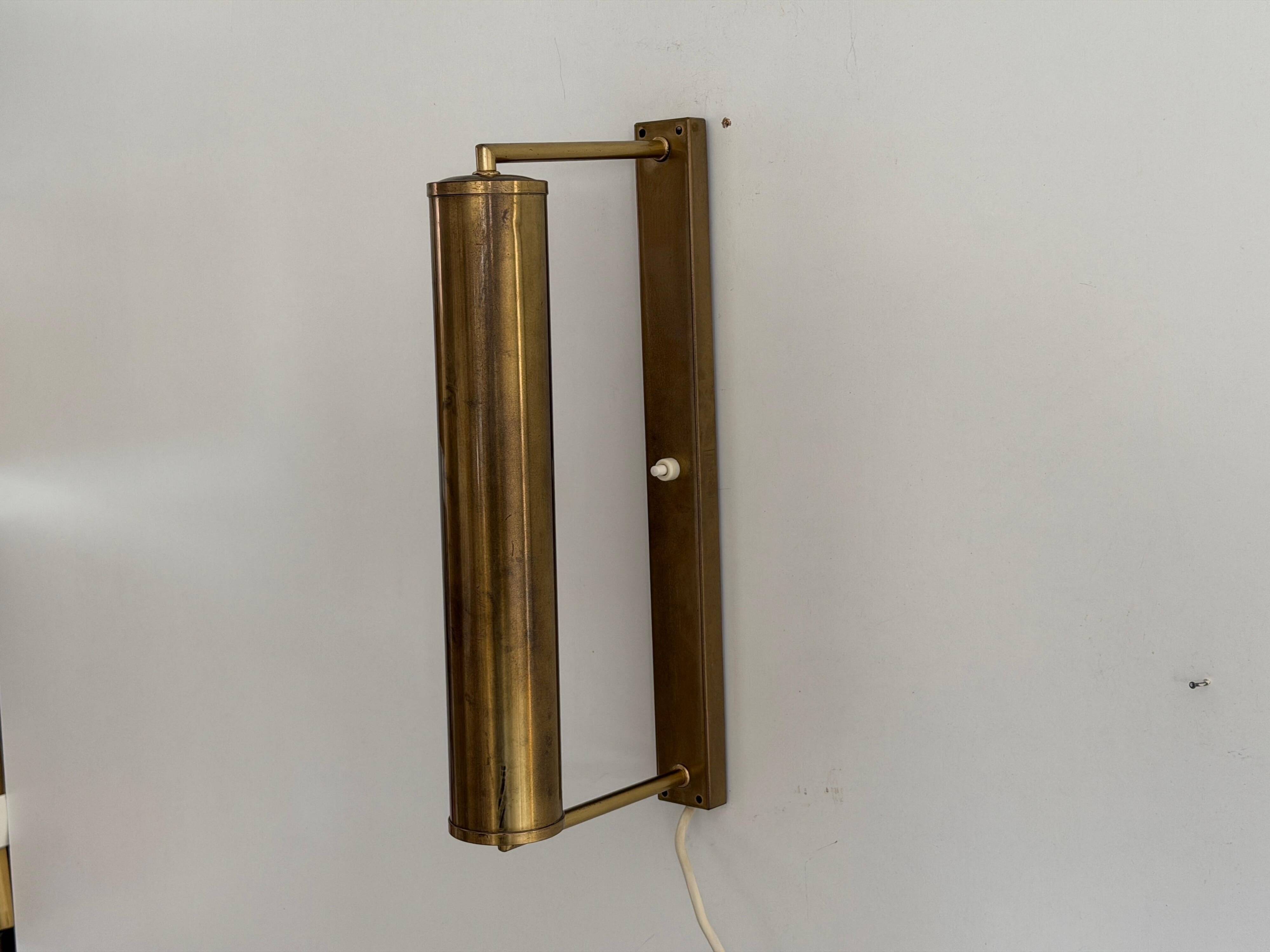 Pair of brass wall lights with adjustable heads from the mid-20th century, 1960, Germany.