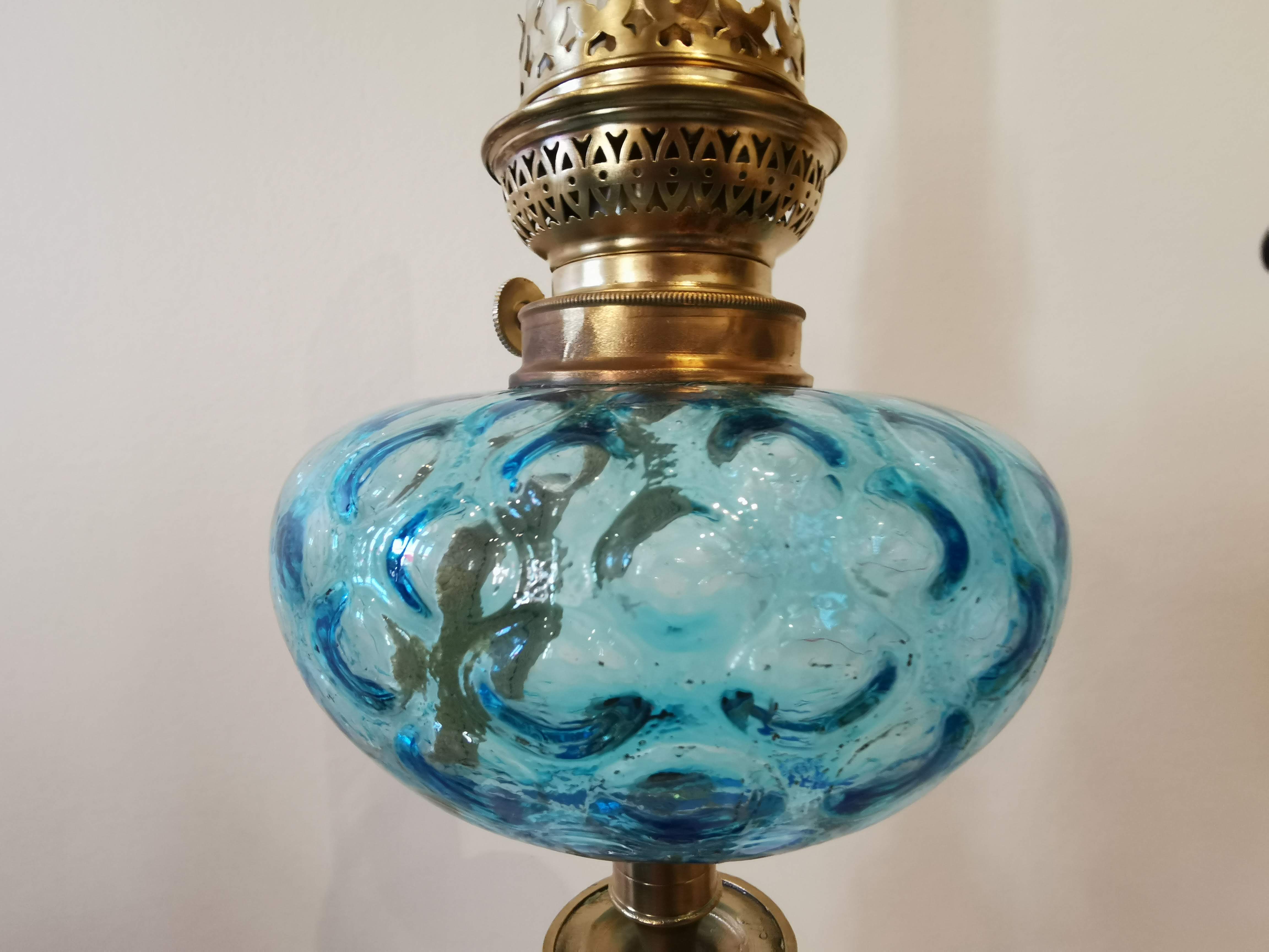Large kerosene lamp mounted on bronze statue. Late nineteenth century