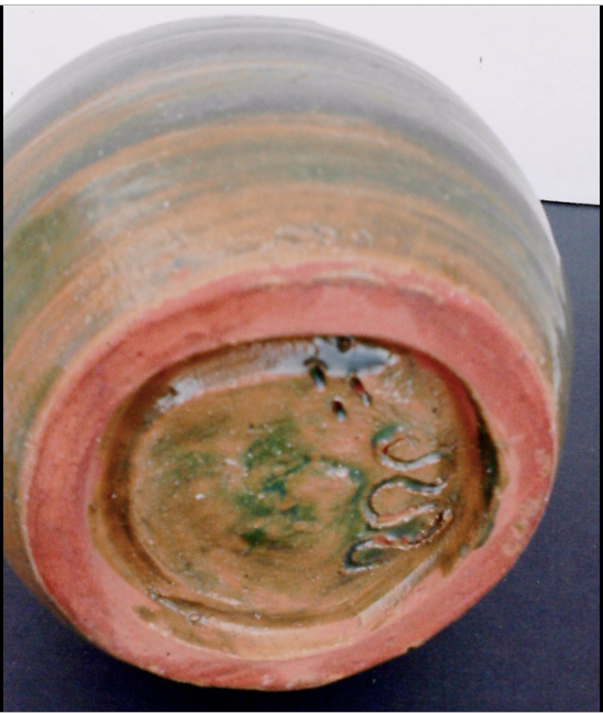 Ceramic vase signed.