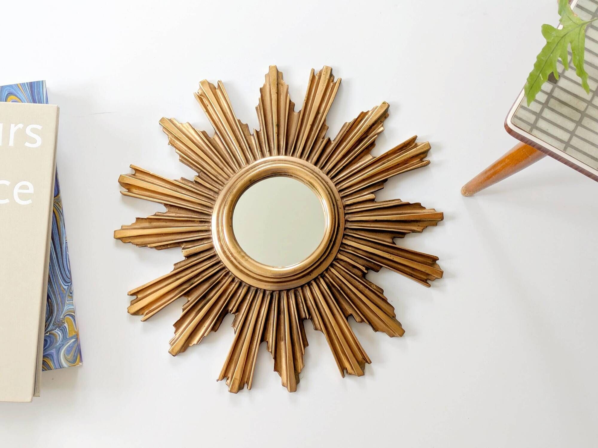 Vintage sunburst mirror in wood and gold resin, 1960s–70s