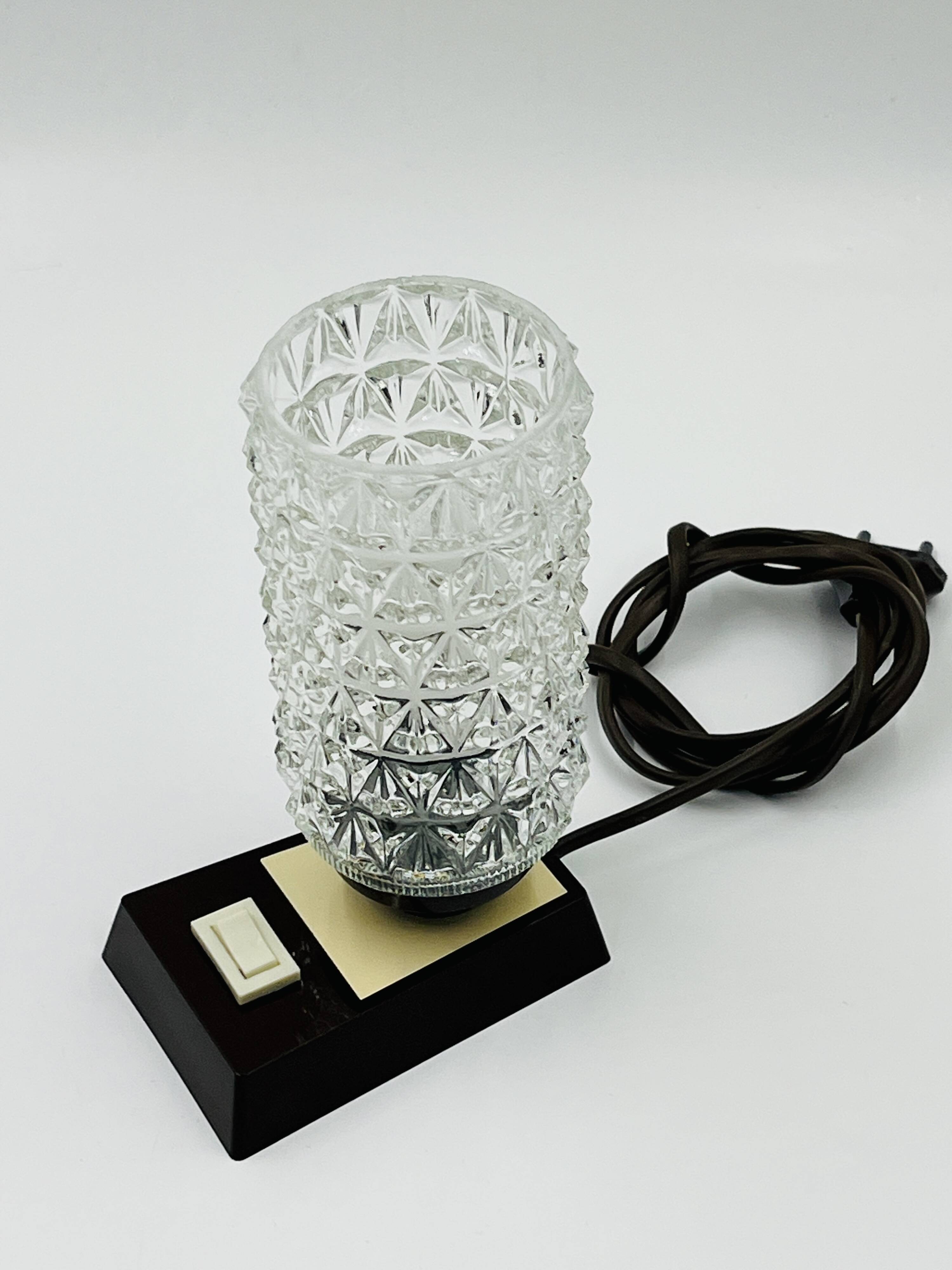 Massive bedside lamp in cut glass