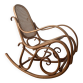 Curved wooden rocking chair