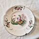 Antique ceramic or earthenware plate from the 19th century, Chinese style decoration