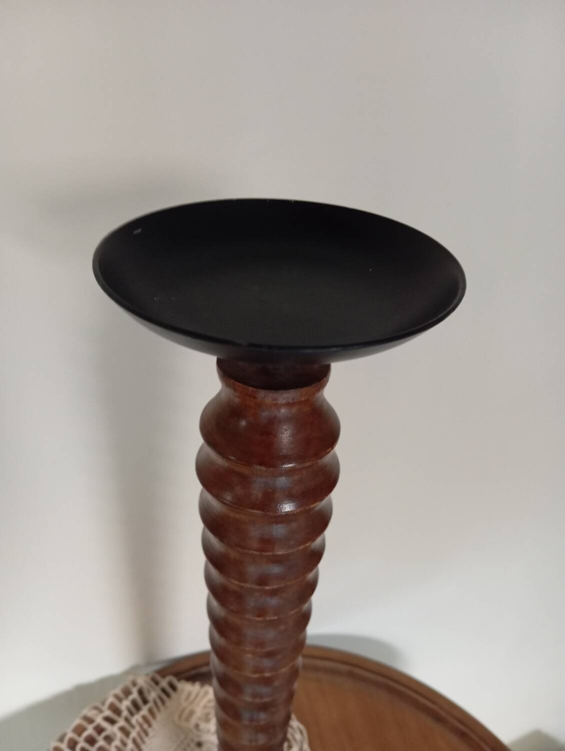 Vintage turned wooden candle holder, black metal candle base