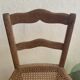 Set of two antique chairs with caning.