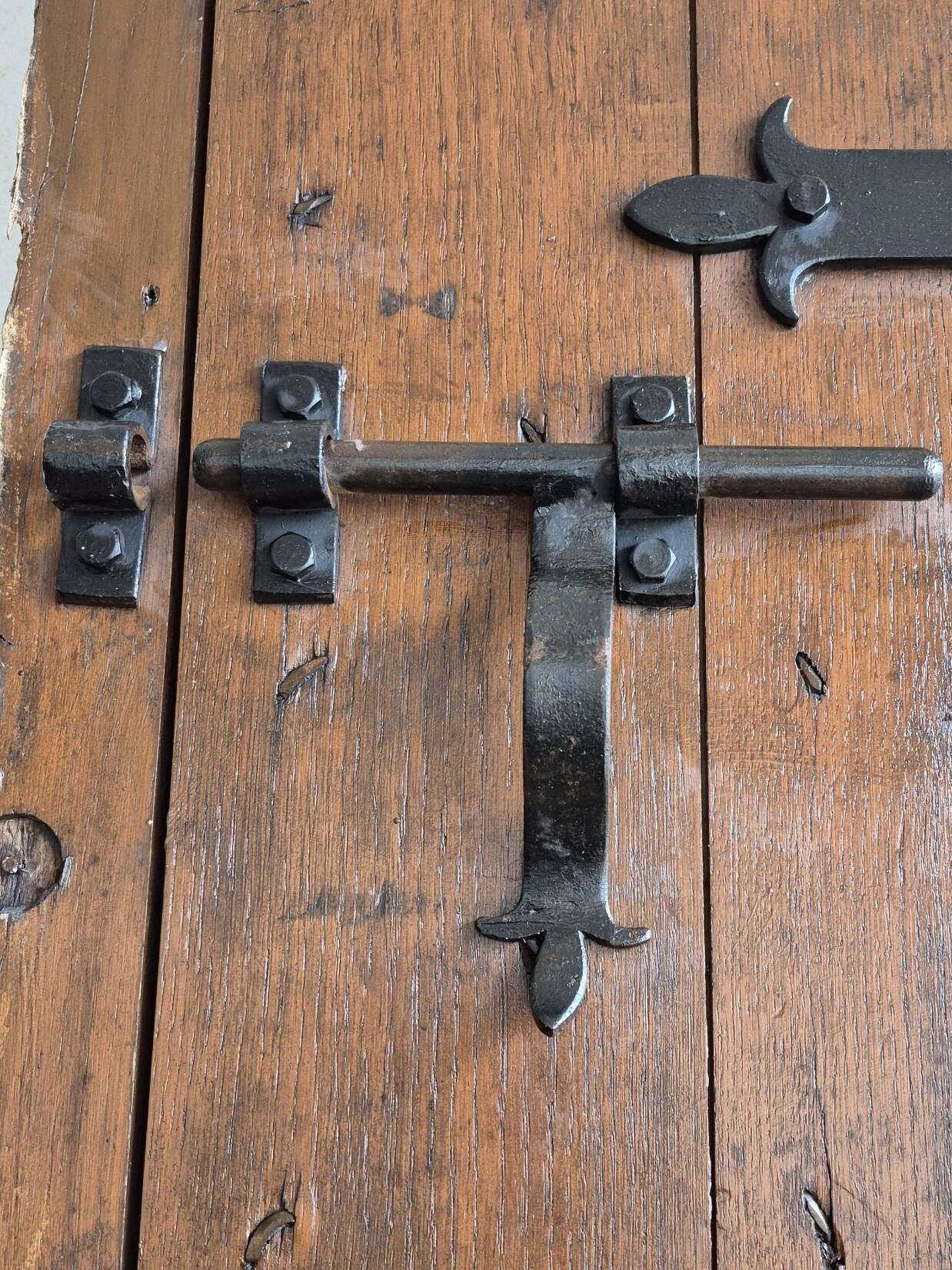 hand-forged studded castle doors + frame from the 1800s/1900s