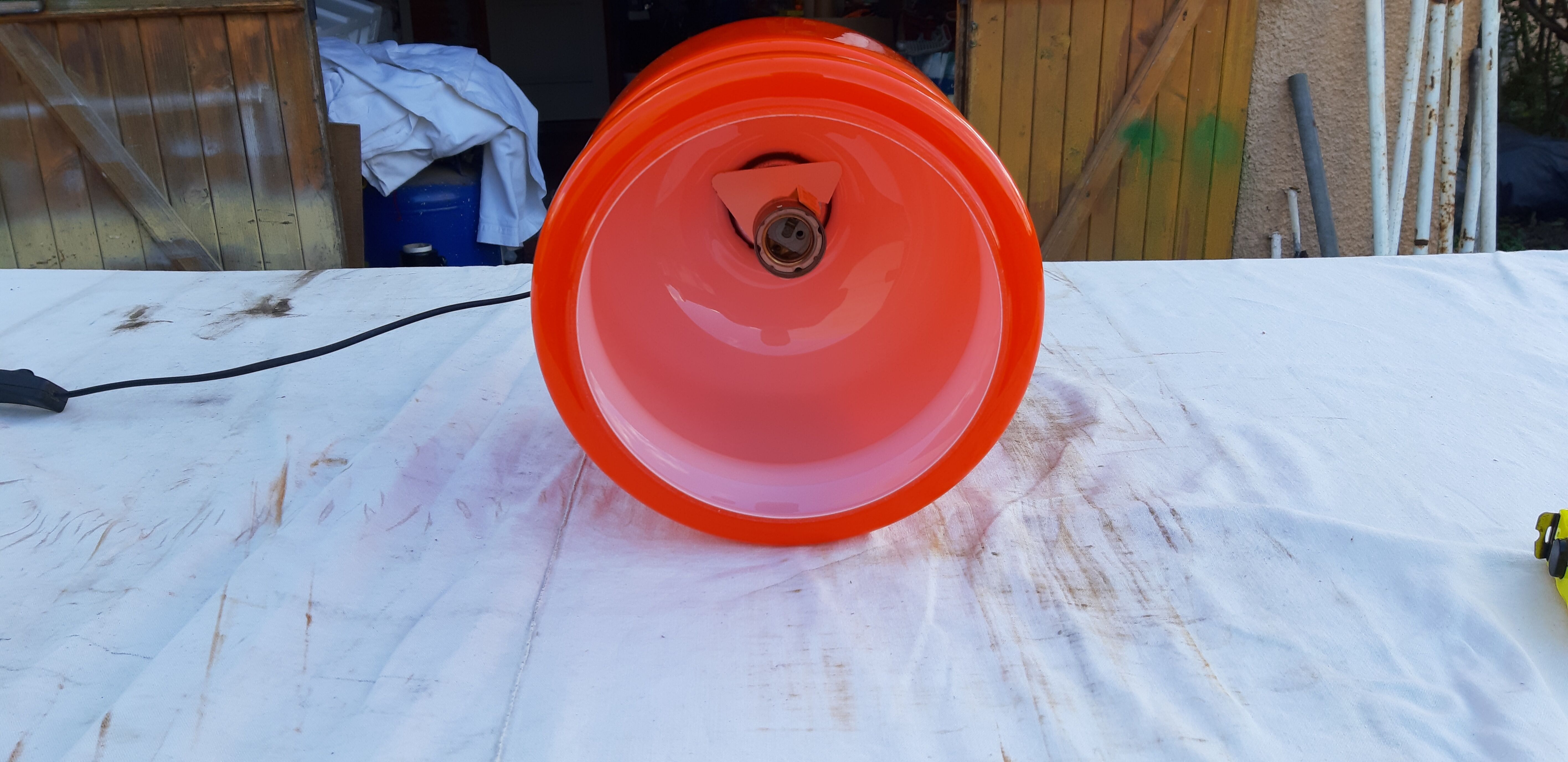 Vintage lamp of the 70s in orange opaline