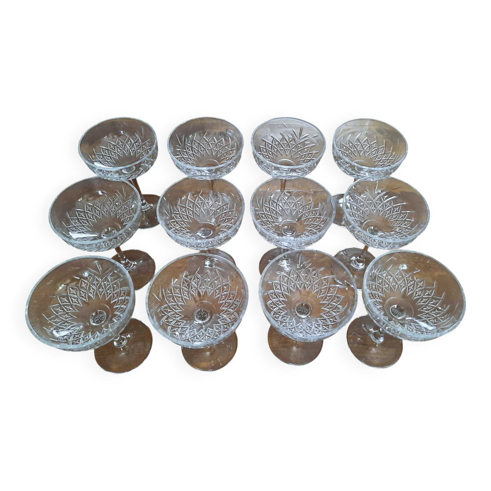 Set of 12 cut glass champagne glasses monogrammed EB.