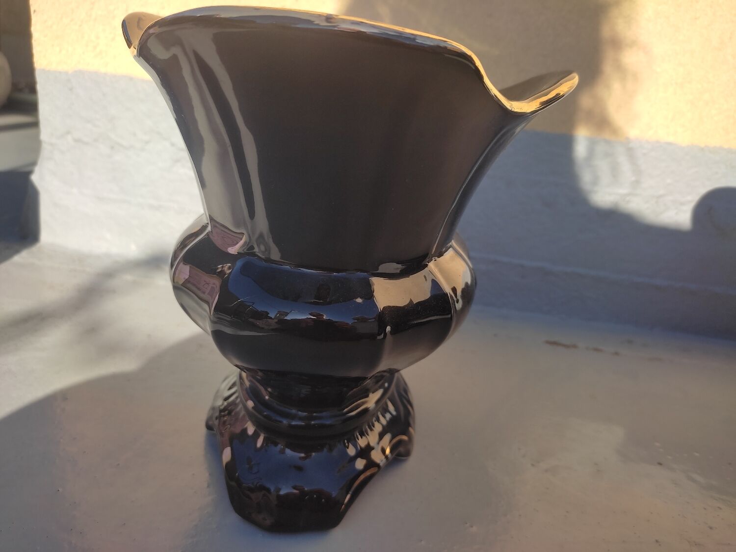 Pair of black earthenware planters