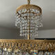 Brass chandelier and crystal tassel waterfall