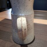 Pitcher in sandstone
